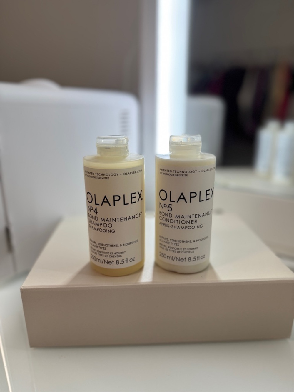 OLAPLEX No.4 & No.5 Bond Maintenance Shampoo and Conditioner - Cream, White